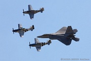 Heritage flight F-22 Raptor and three Mustangs